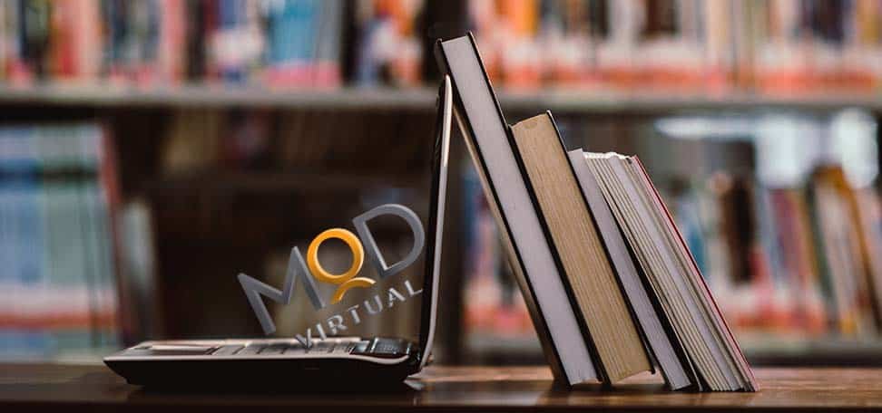 myoutdesk logo in laptop next to books