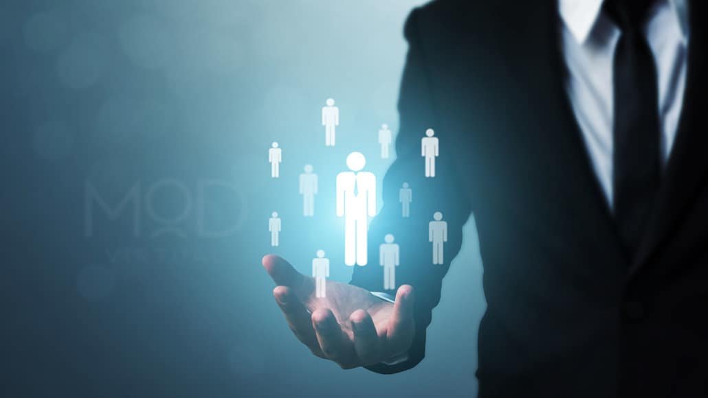 business man holding out hand with virtual icons of people myoutdesk