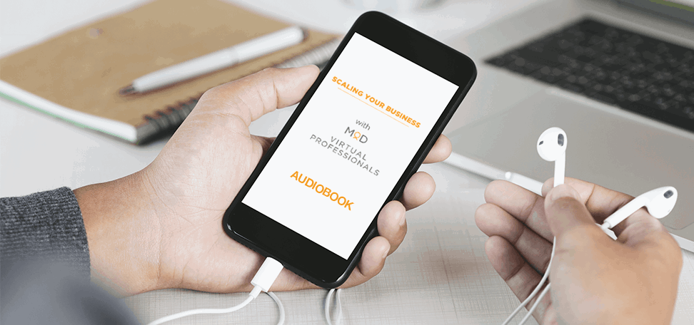 scaling your business with virtual professionals audiobook on phone screen being held