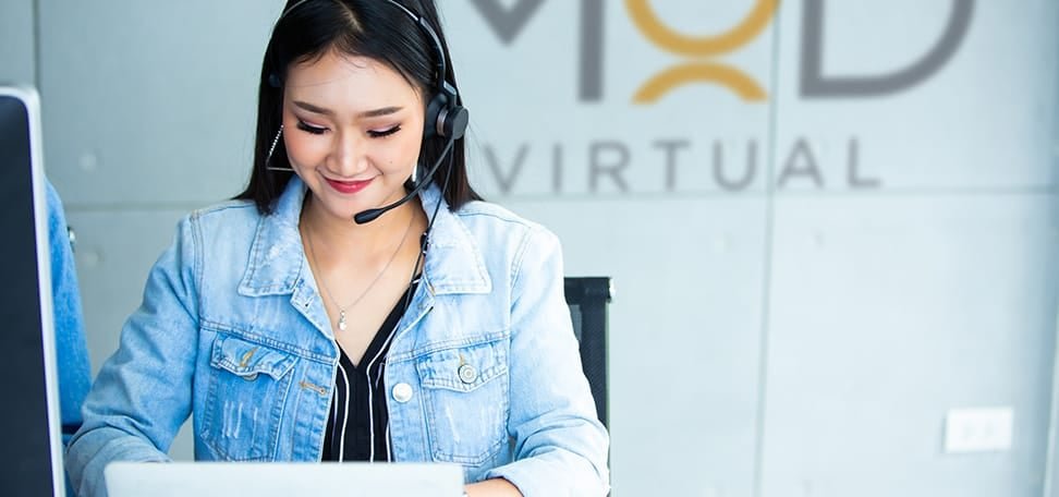 happy virtual assistant working with a headset using instagram