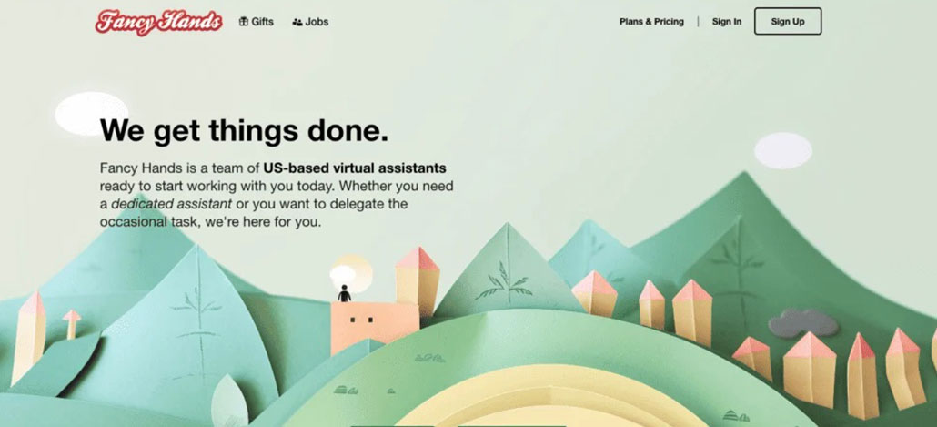 Screenshot of Fancy Hands website homepage, one of the best virtual assistant companies, featuring the slogan We get things done, description of US-based virtual assistants, a colorful paper-cut illustration of hills and buildings, and a top navigation menu.